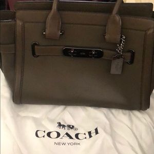 Coach handbag with strap